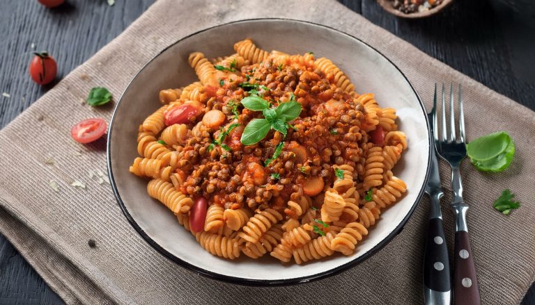 A hearty lentil bolognese made from red lentils, tomatoes and herbs served with wholemeal pasta